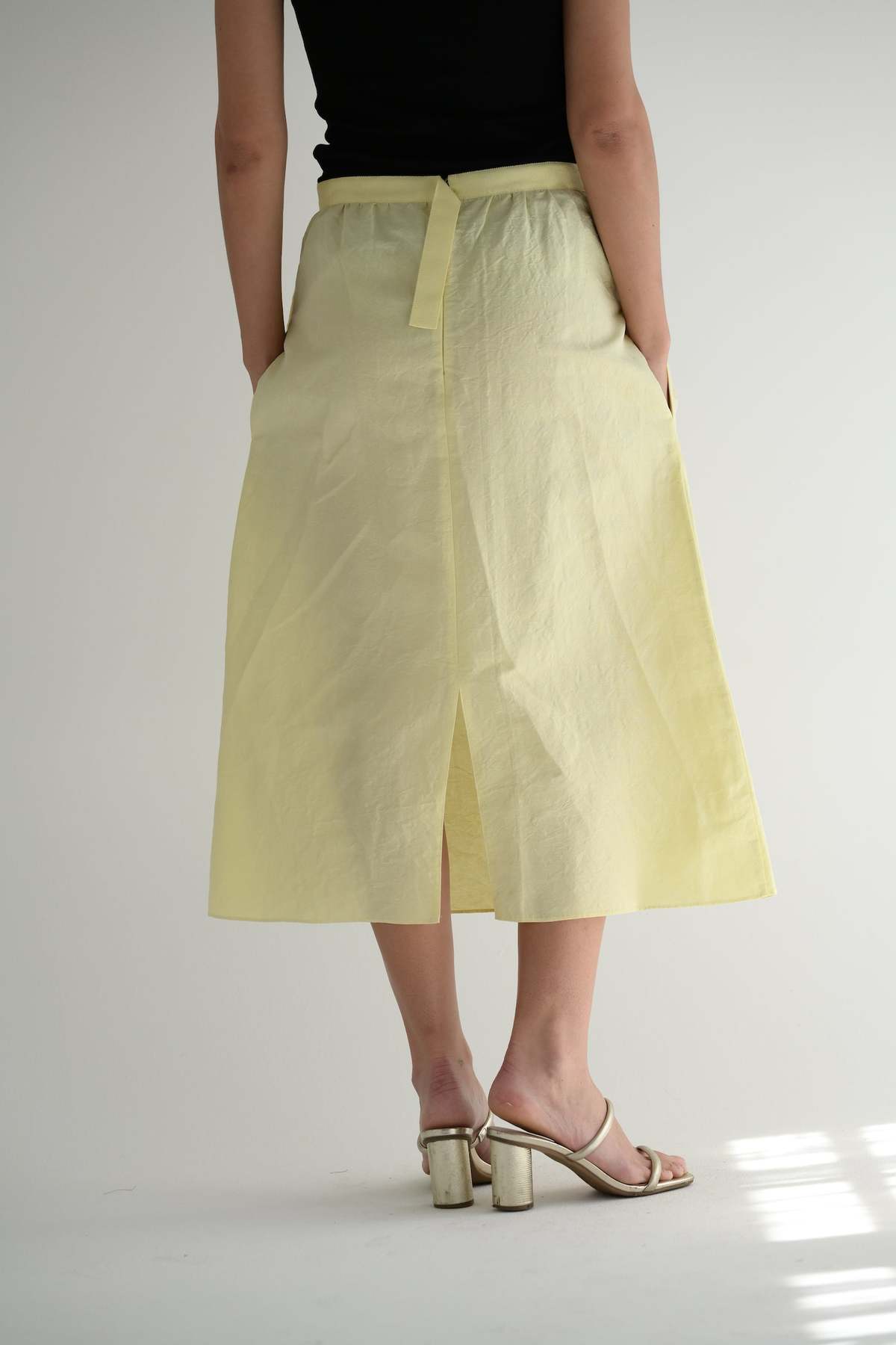 So yellow skirt