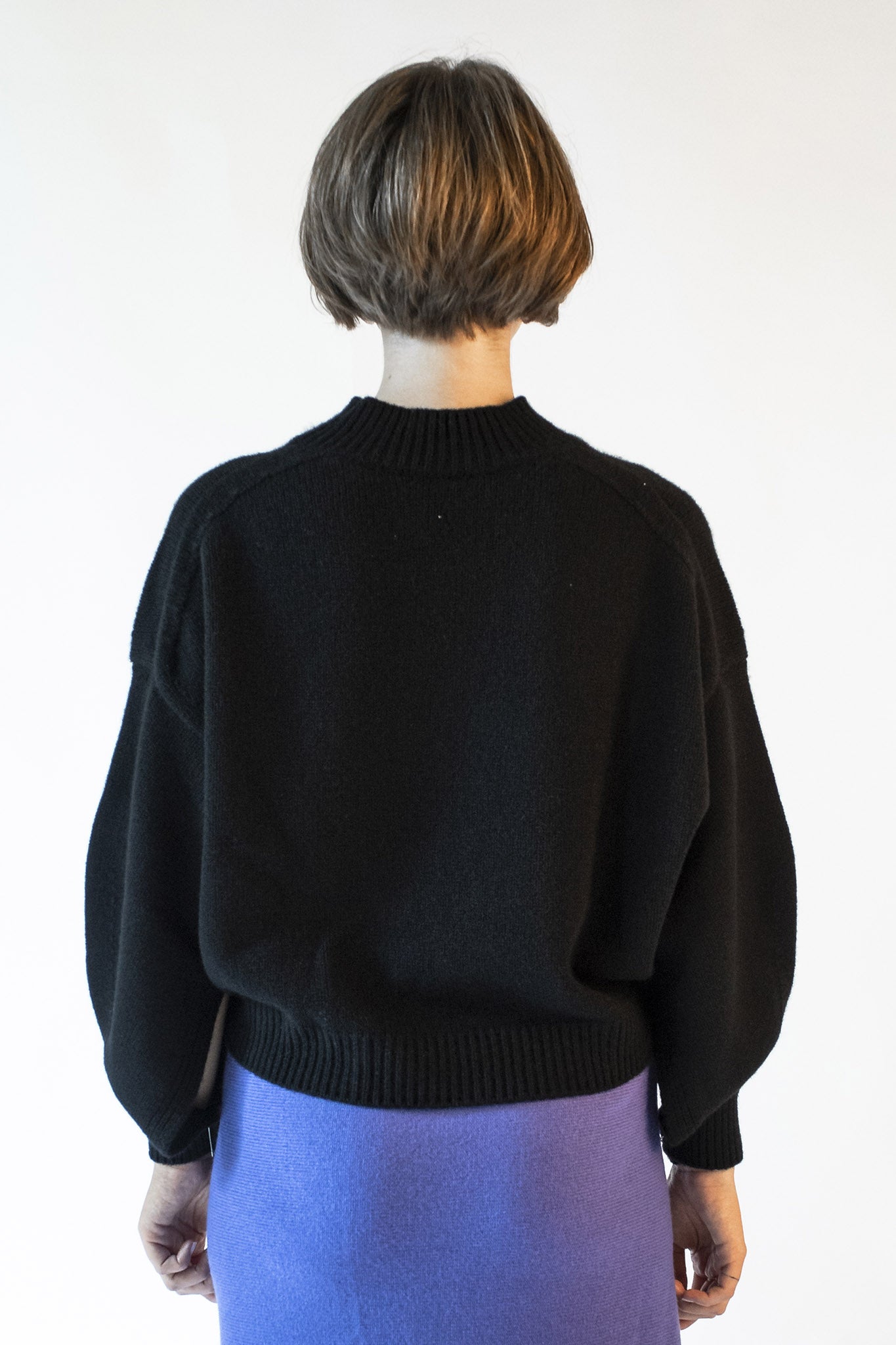 Black mock neck sweater with Isabella jewel buttons