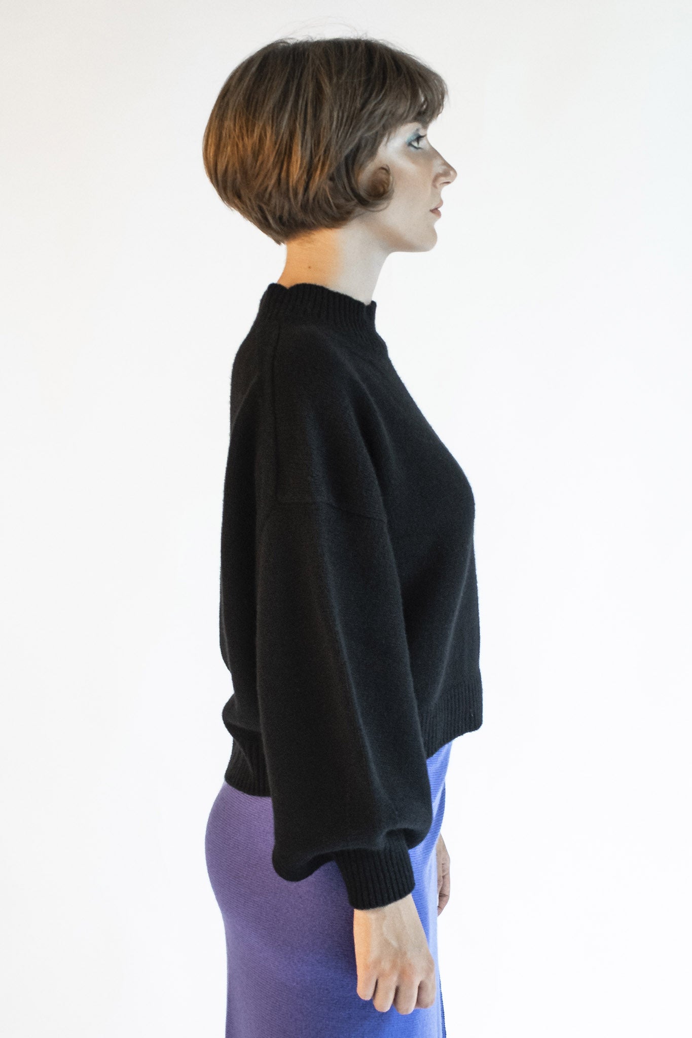 Black mock neck sweater with Isabella jewel buttons